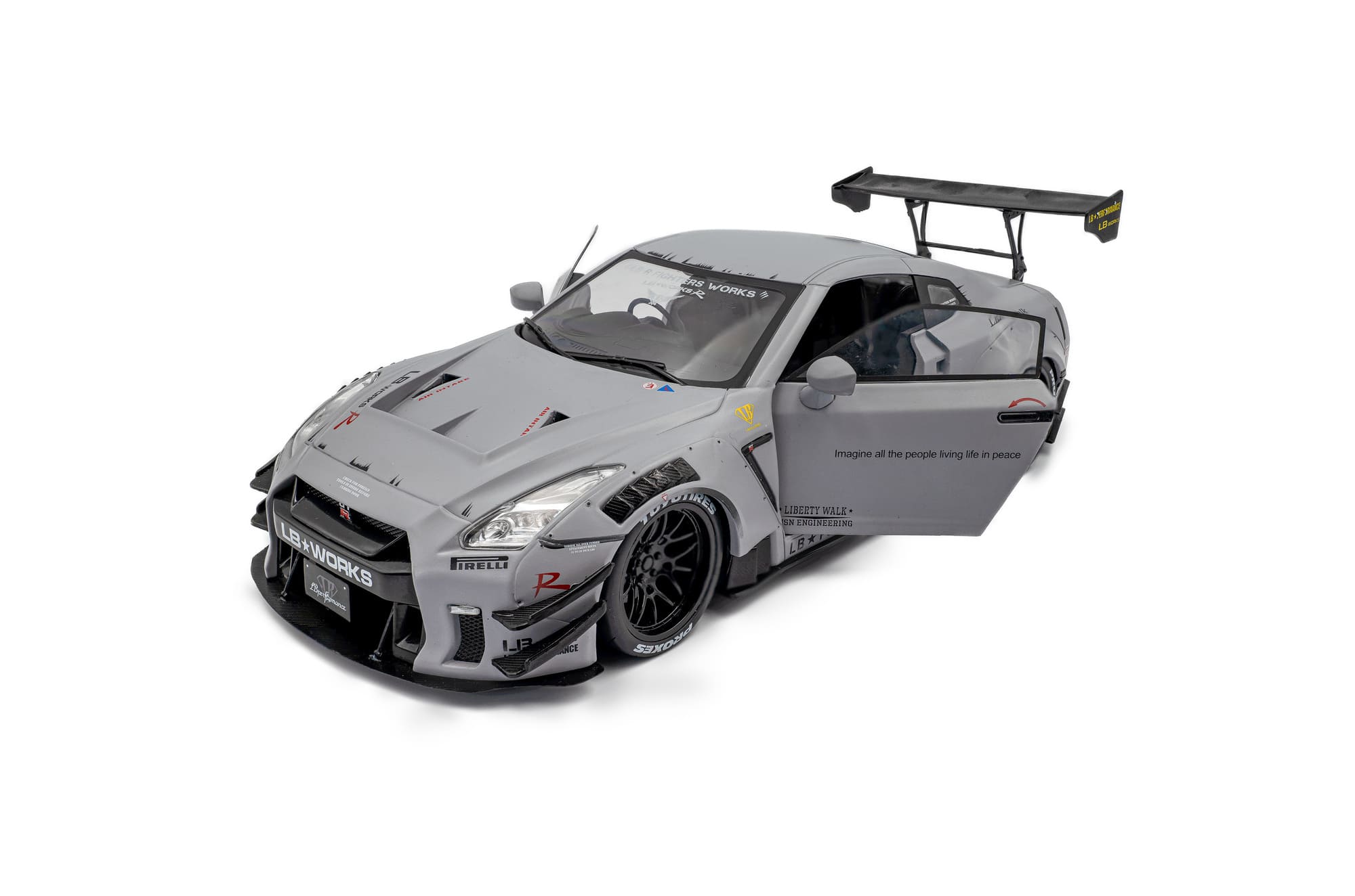 Solido 1_18 Nissan GT-R _R35_ grau mit Figur