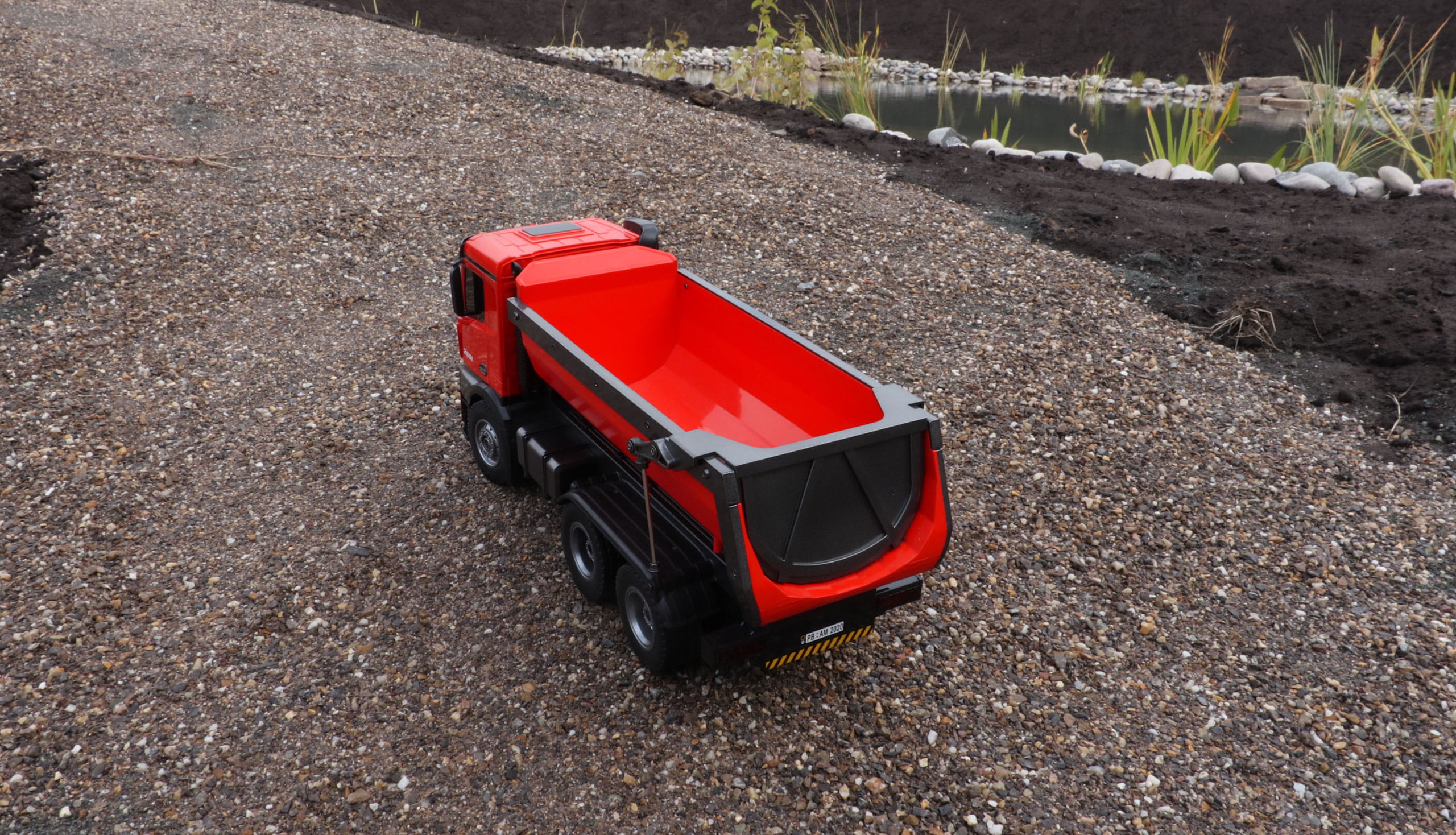 Amewi Mercedes-Benz Arocs LKW Kipper 2,4GHz RTR 1:18 rot