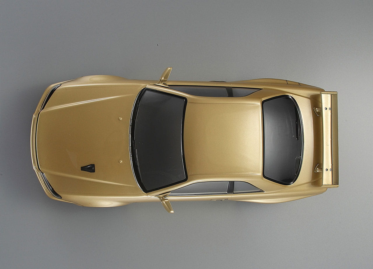 Killerbody Nissan Skyline R34 195mm Champagner Gold lackiert, RTU all-i