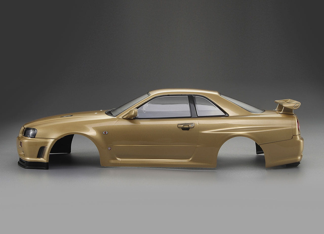 Killerbody Nissan Skyline R34 195mm Champagner Gold lackiert_ RTU all-i - RC-Zubehoer