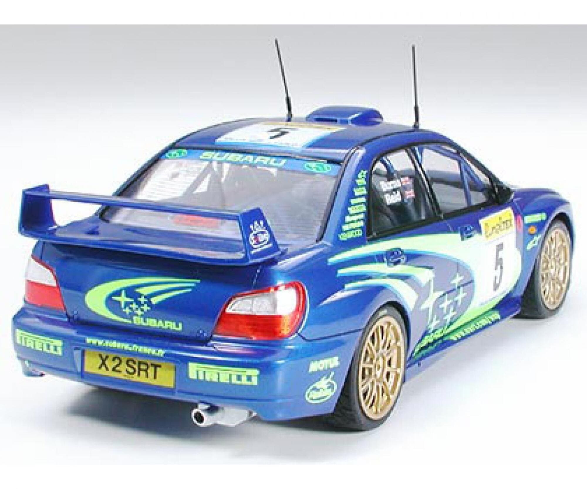 Tamiya 1_24 Subaru Impreza WRC 2001 Modellbausatz mit goldenen Raedern und detailliertem Interieur