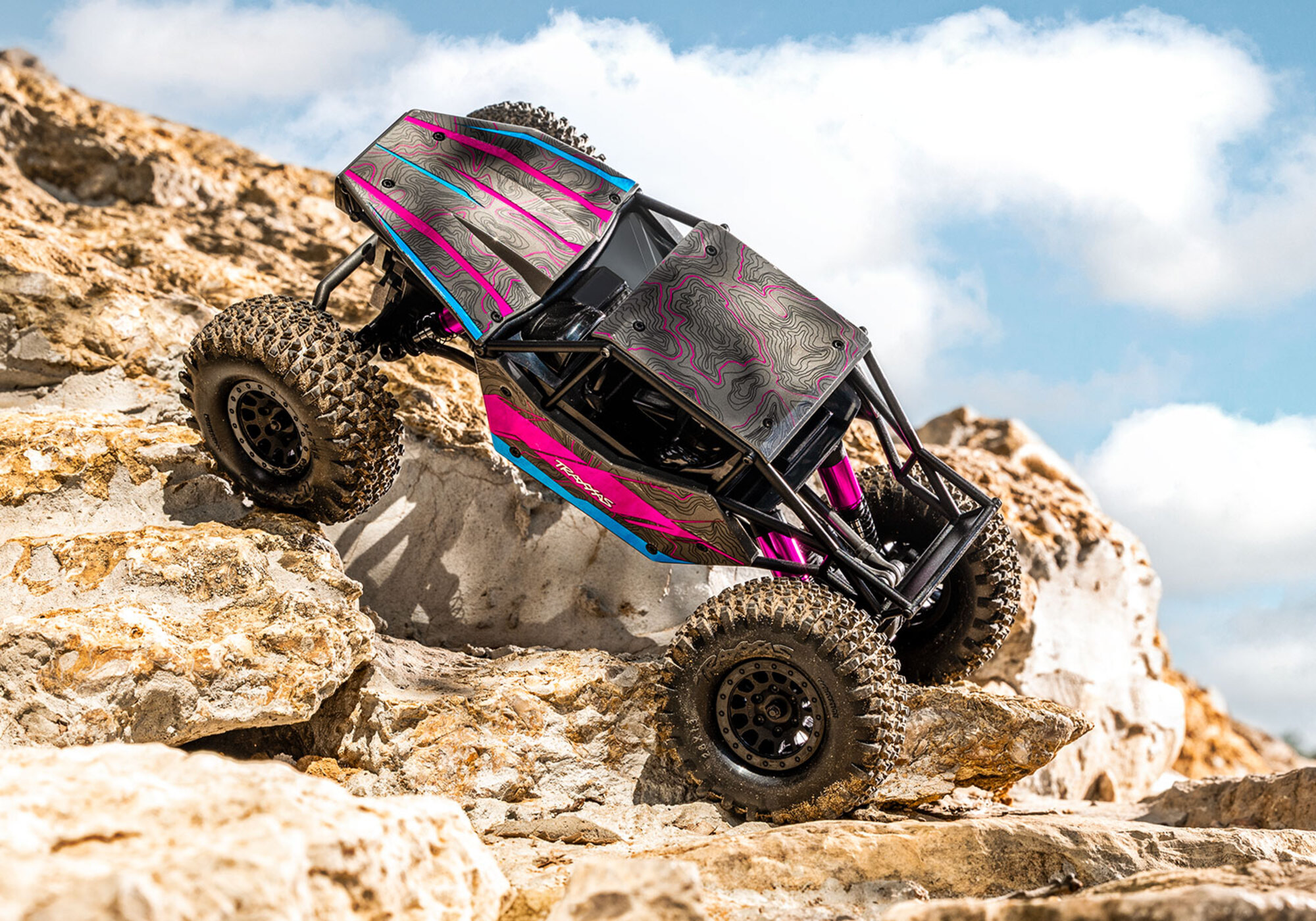 Traxxas TXC-4M Extreme Crawler Pink 1_18 Brushless 4WD RTR mit 3S LiPo Akku und USB-Ladegeraet