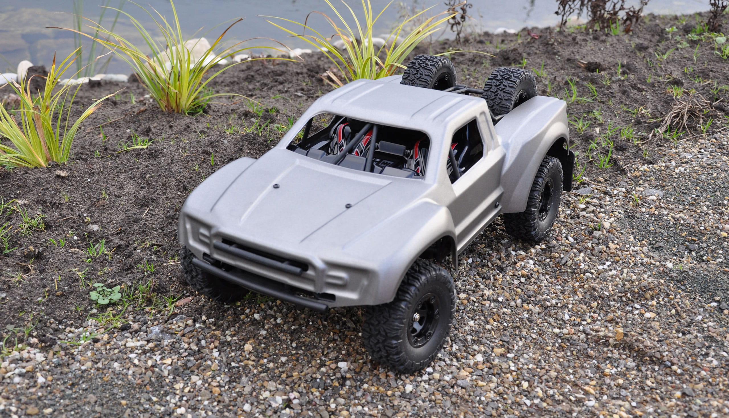 Amewi Short Course Truck SC12 2,4GHz brushed 1:12 RTR grau
