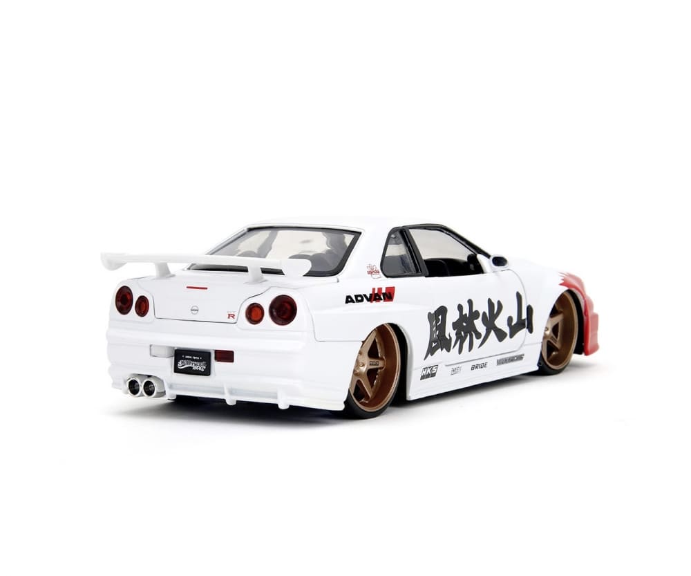 Jada Street Fighter Nissan Skyline GT-R Modellauto 1_24 mit Ryu Figur