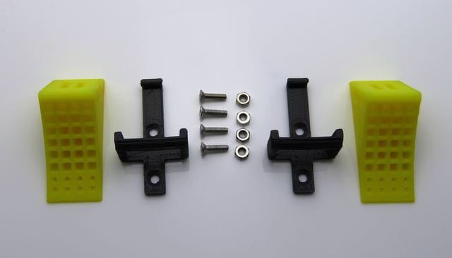 Thicon 1:14 Hemmschuhe gelb mit Halter schwarz 2Stück Thicon 1_14 Hemmschuhe gelb mit Halter schwarz 2Stueck - RC-Zubehoer