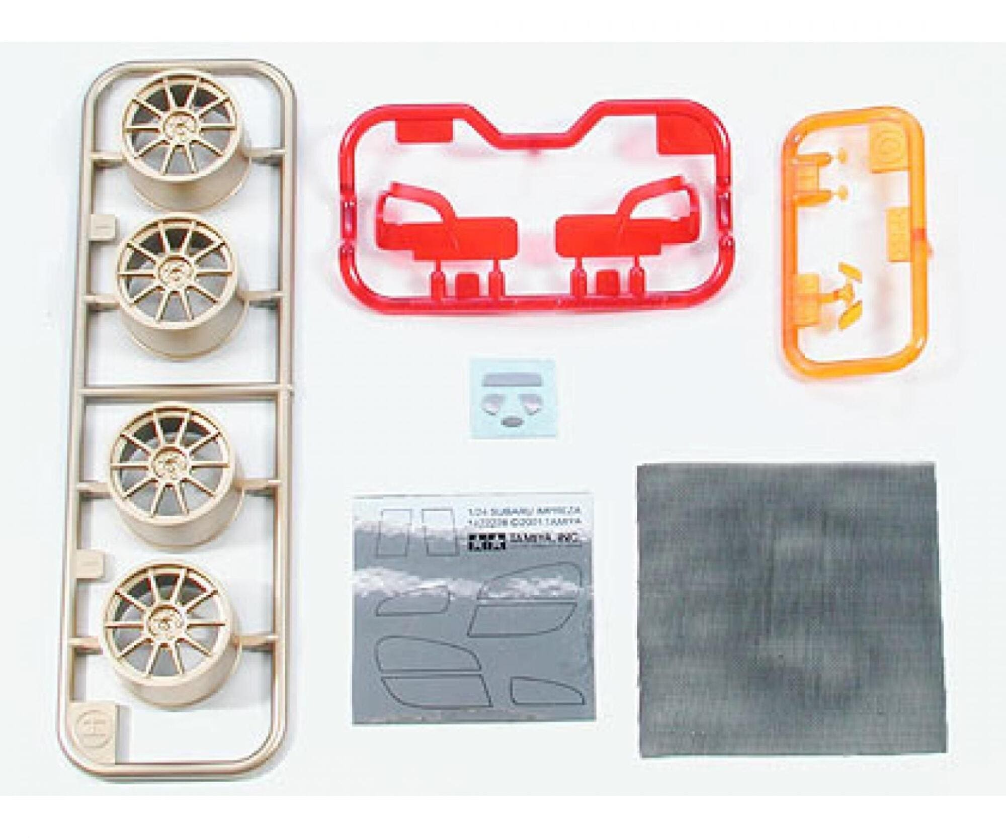 Tamiya 1_24 Subaru Impreza WRC 2001 Modellbausatz mit goldenen Raedern und detailliertem Interieur